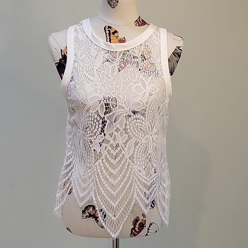 AC lace tank top with handkerchief hem.   Very romantic vibe.  Size is Medium.